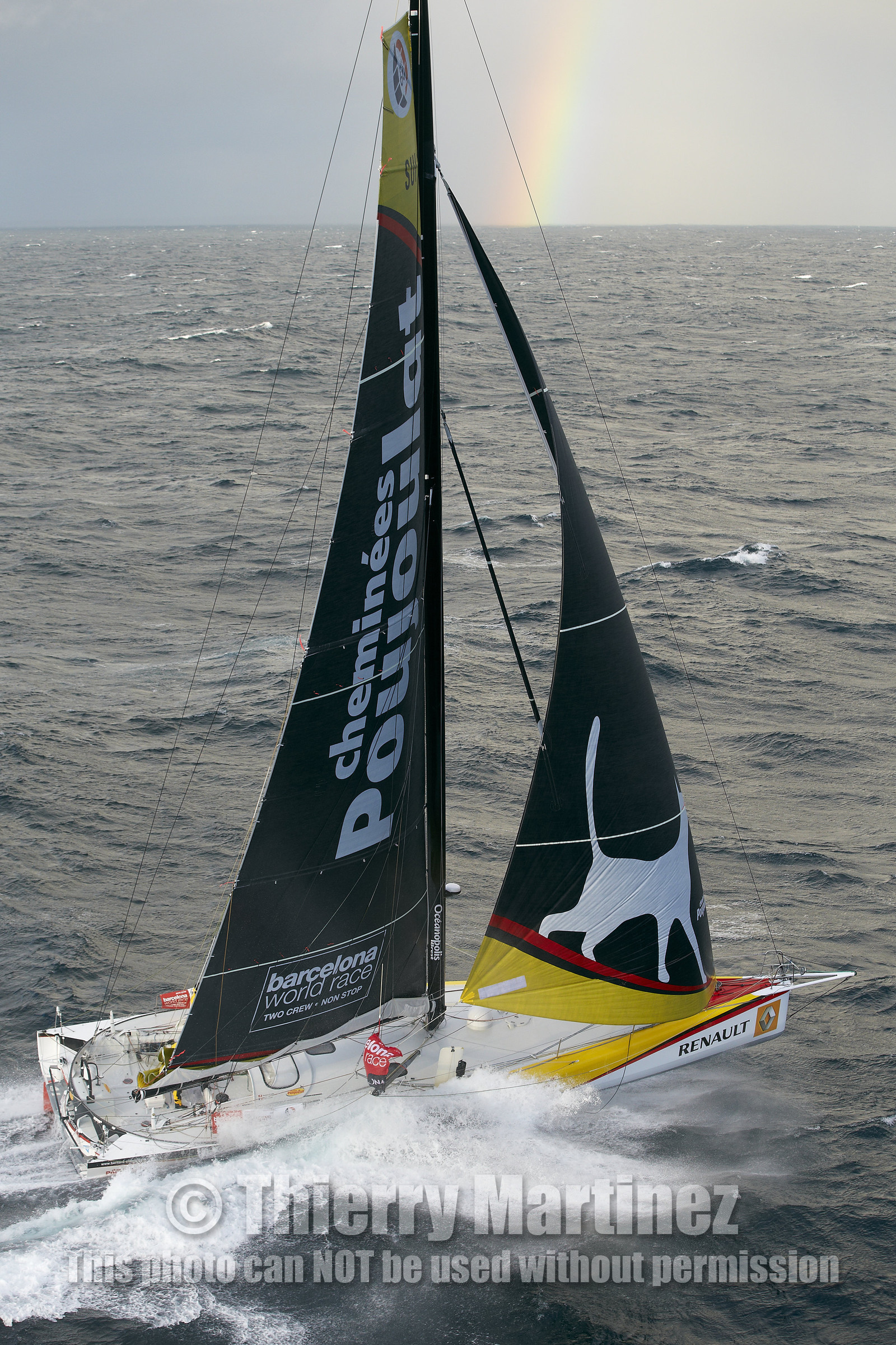2014 BARCELONA WORLD RACE. Bernard Stamm (SUI) & Jean Le Cam (FRA) on CHEMINEES POUJOULAT