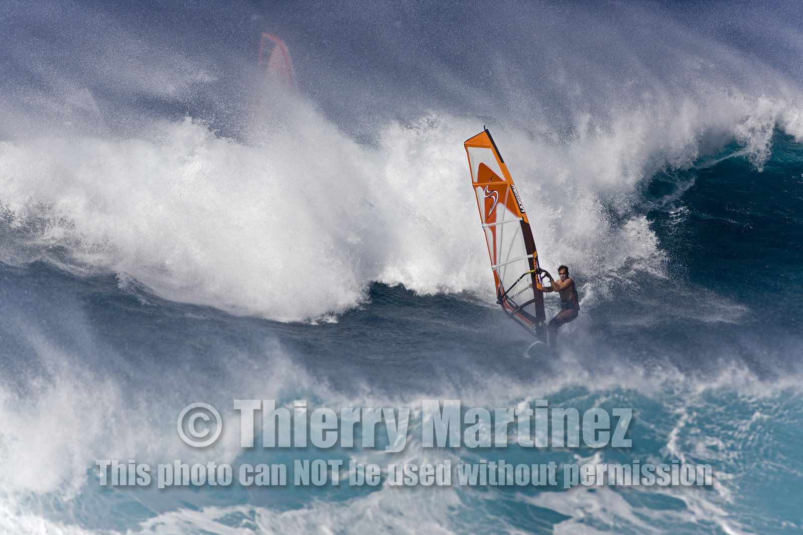 Windsurf in waves at Hookip'a Beach - North Shore Maui - Hawaii.