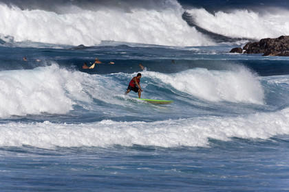 Stand Up Paddle  in waves at Hookip'a Beach - North Shore Maui - Hawaii.