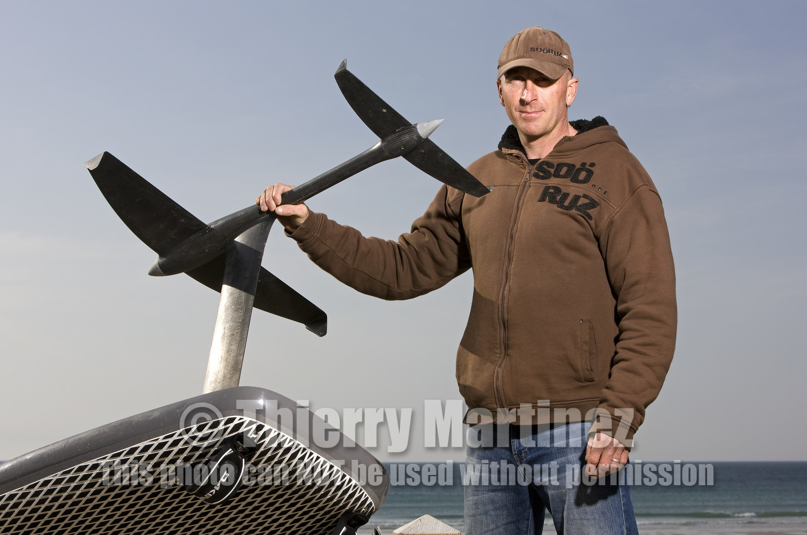 Bruno Andre (FRA) foiling with a windsurf.