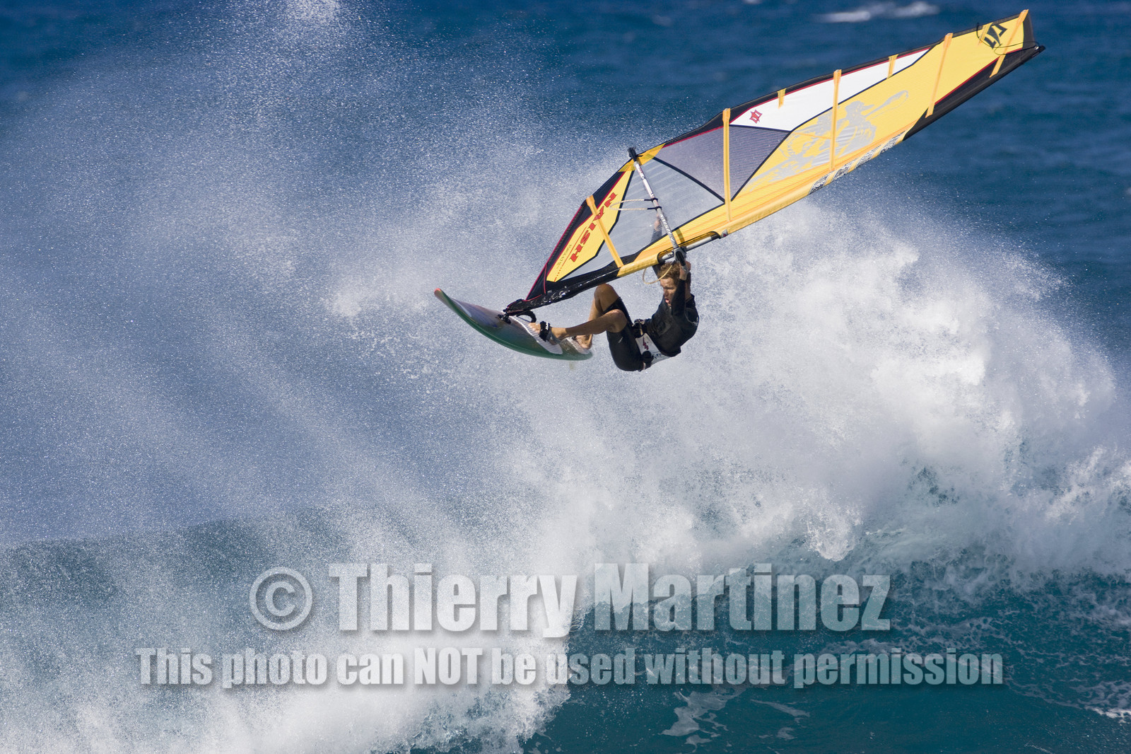 Windsurf in waves at Hookip'a Beach - North Shore Maui - Hawaii.