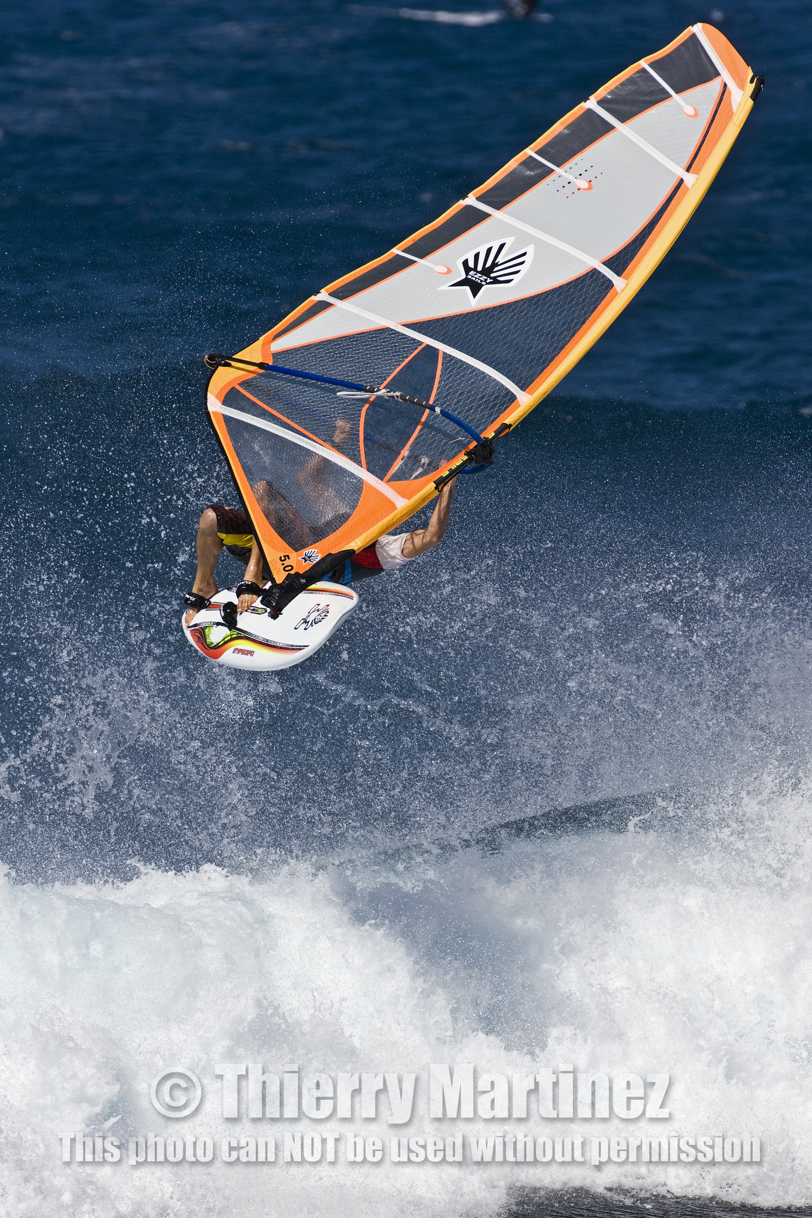 Windsurf in waves at Hookip'a Beach - North Shore Maui - Hawaii.