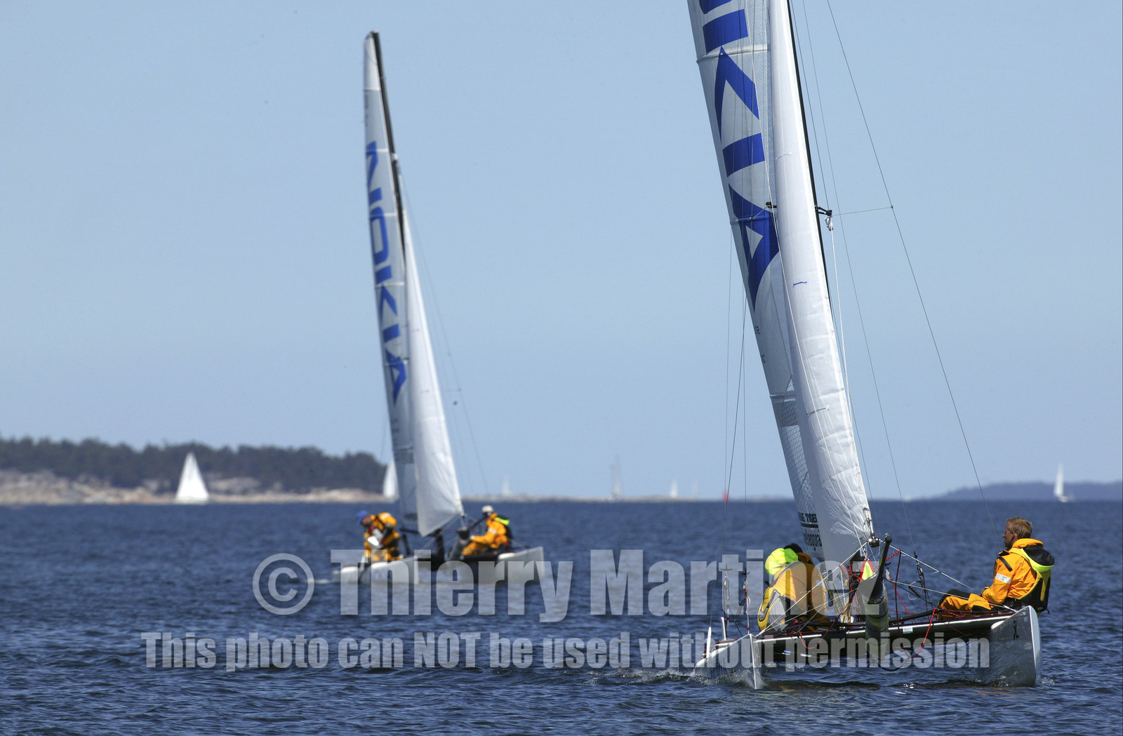 03_3057D   © Th.Martinez,STOCKHOLM ARCHIPELAGO SWEDEN, 8 07 03-Archipelago Raid (2003)  Day 1. Team NOKIA-Adilstam  .Frederik Aldistam (SWe) & Tomas Marimon (SWE) and Team NOKIA Kempff  Joakim Kempff & magnus Nordstrom.