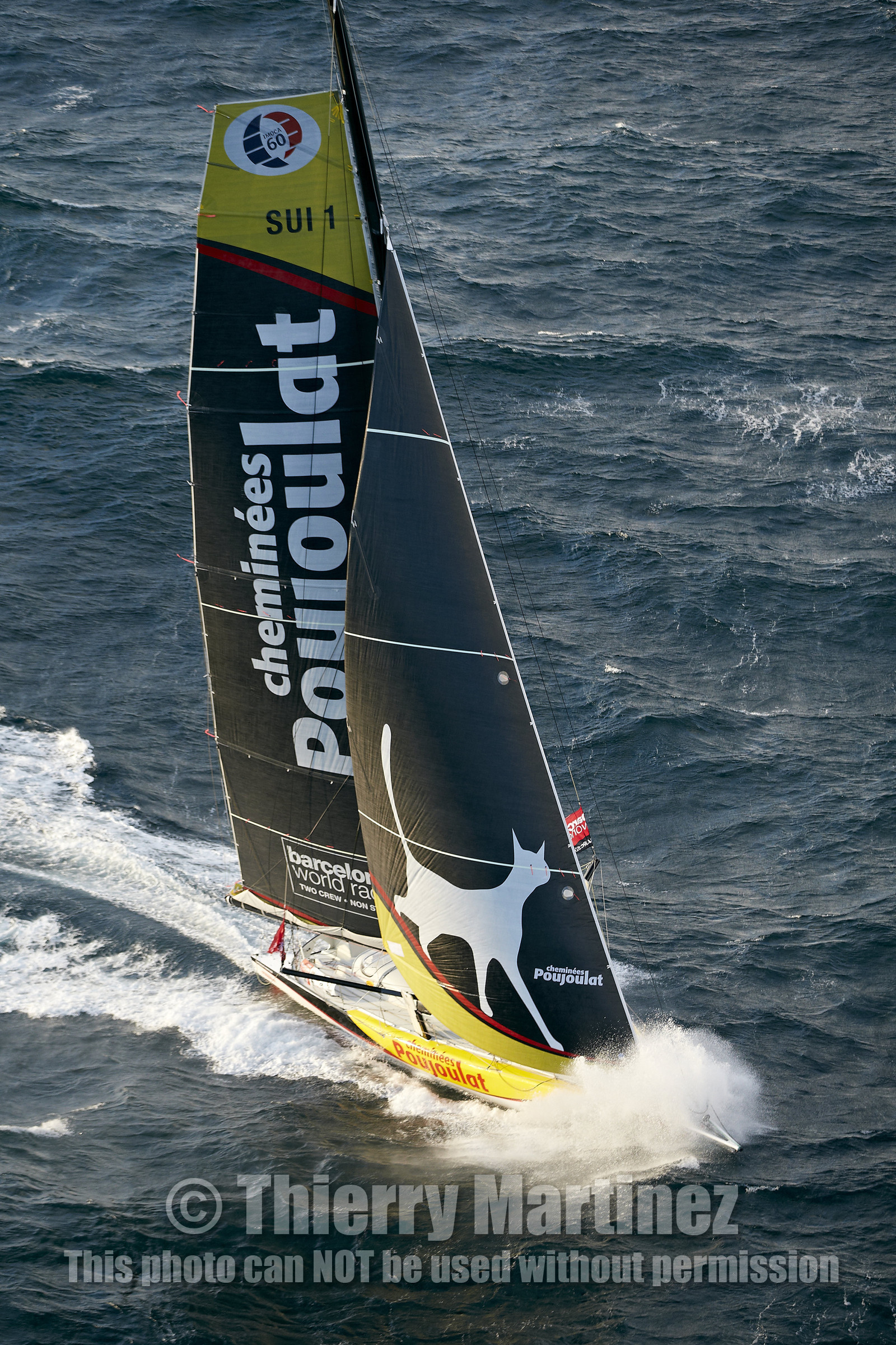 2014 BARCELONA WORLD RACE. Bernard Stamm (SUI) & Jean Le Cam (FRA) on CHEMINEES POUJOULAT