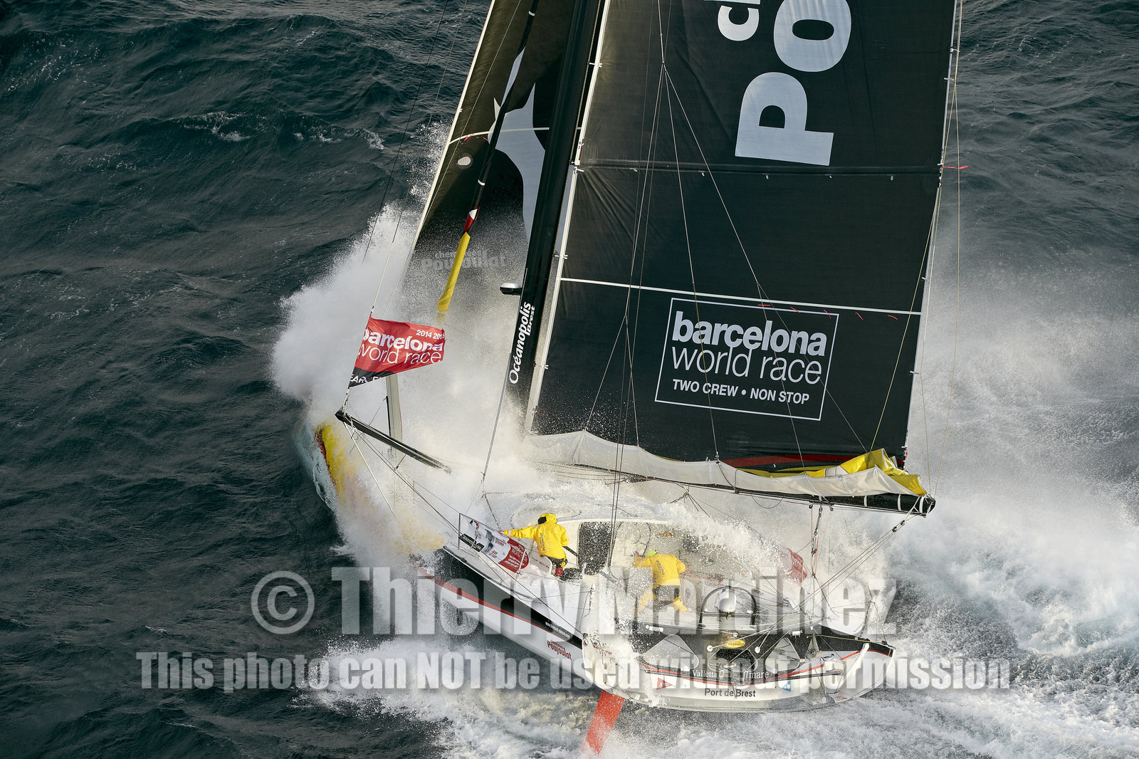 2014 BARCELONA WORLD RACE. Bernard Stamm (SUI) & Jean Le Cam (FRA) on CHEMINEES POUJOULAT