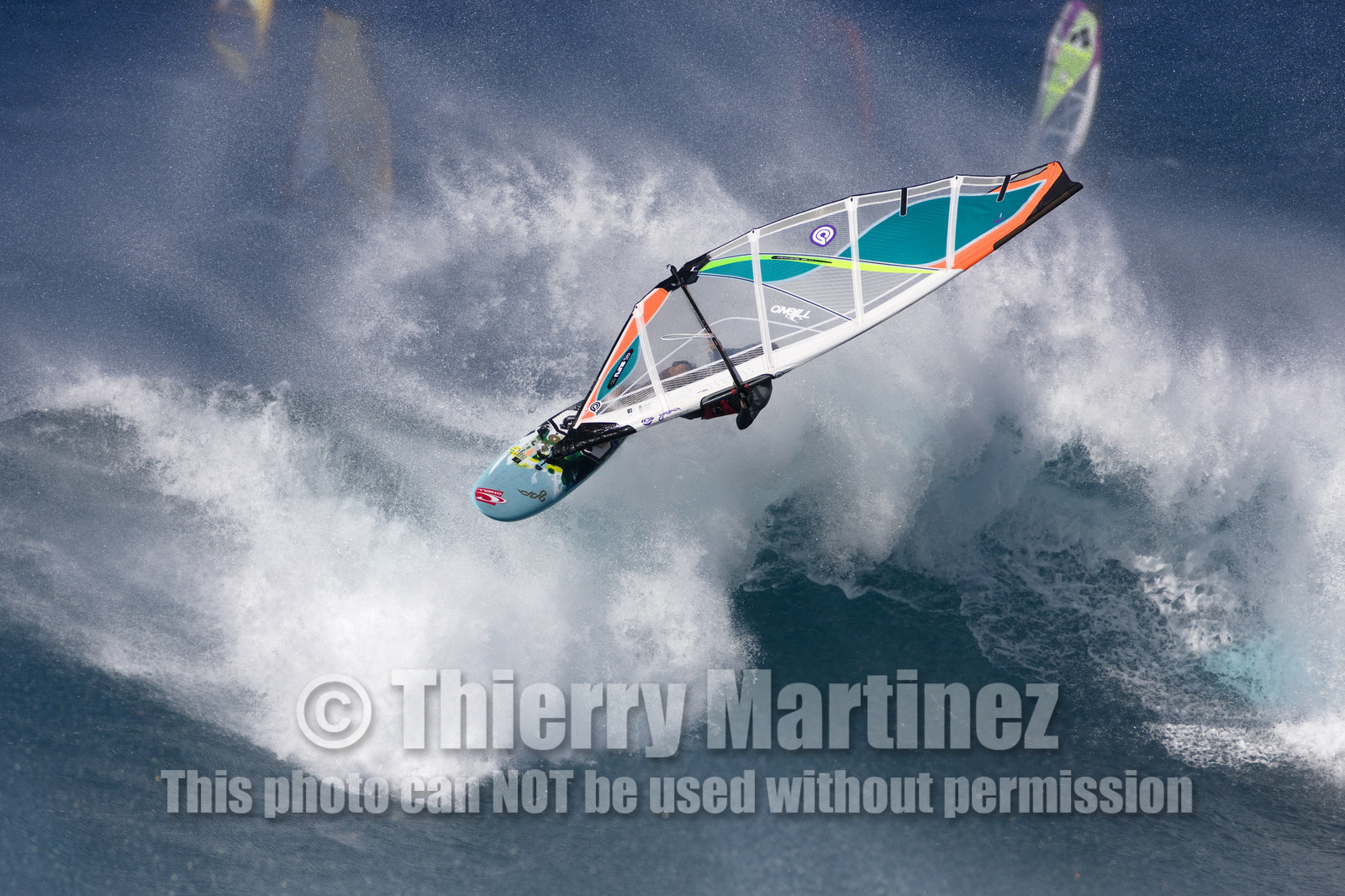 Windsurf in waves at Hookip'a Beach - North Shore Maui - Hawaii.