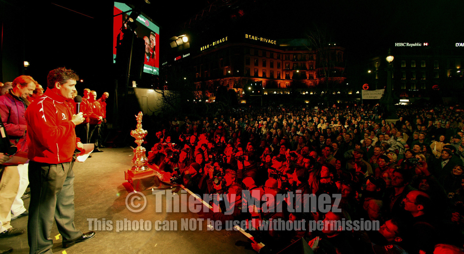 03_2253D ©Th.Martinez .Geneva , Switzerland. America's Cup 2003. 8th March 2003.Alinghi Team winner of America's Cup 2003..Welcome to Alinghi Team in Geneva..Alinghi's Skipper doing a speach in French to the public, to thanks fan's of their support...