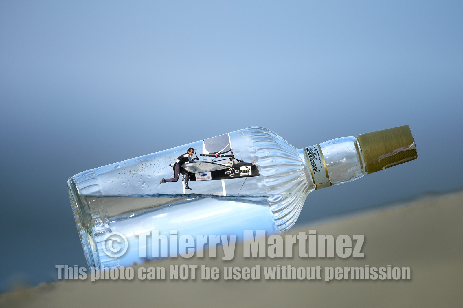 Photomontage.  Bora Gulari (USA) flying Moth in a bottle.