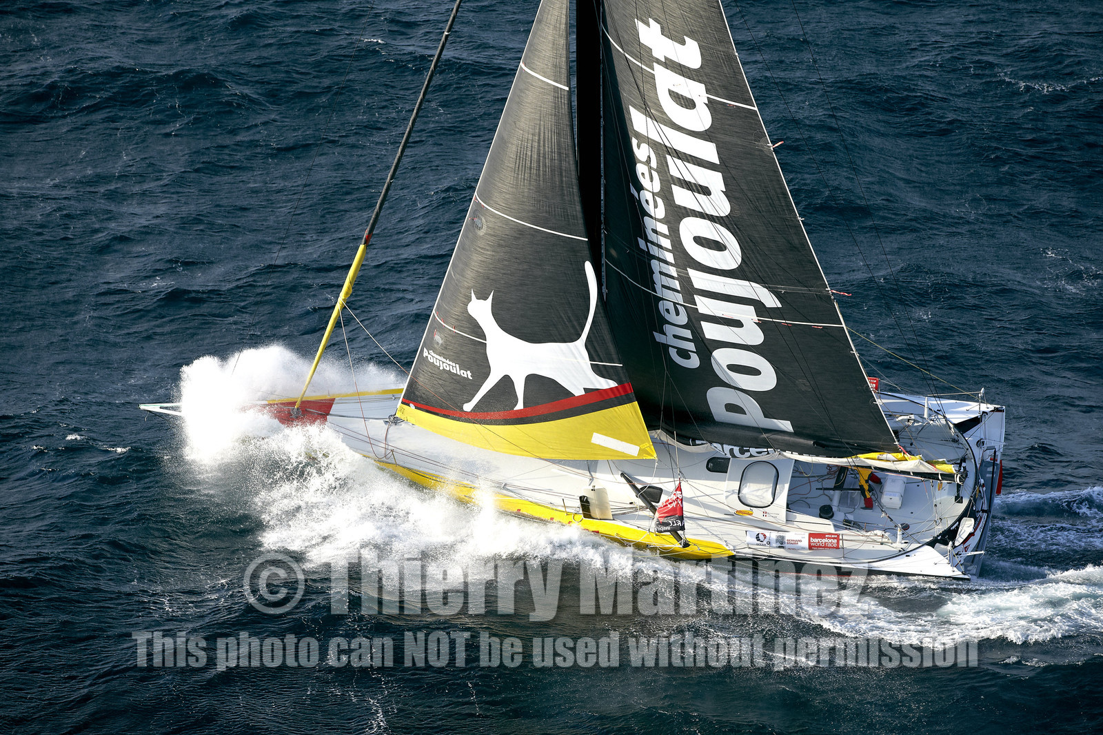 2014 BARCELONA WORLD RACE. Bernard Stamm (SUI) & Jean Le Cam (FRA) on CHEMINEES POUJOULAT