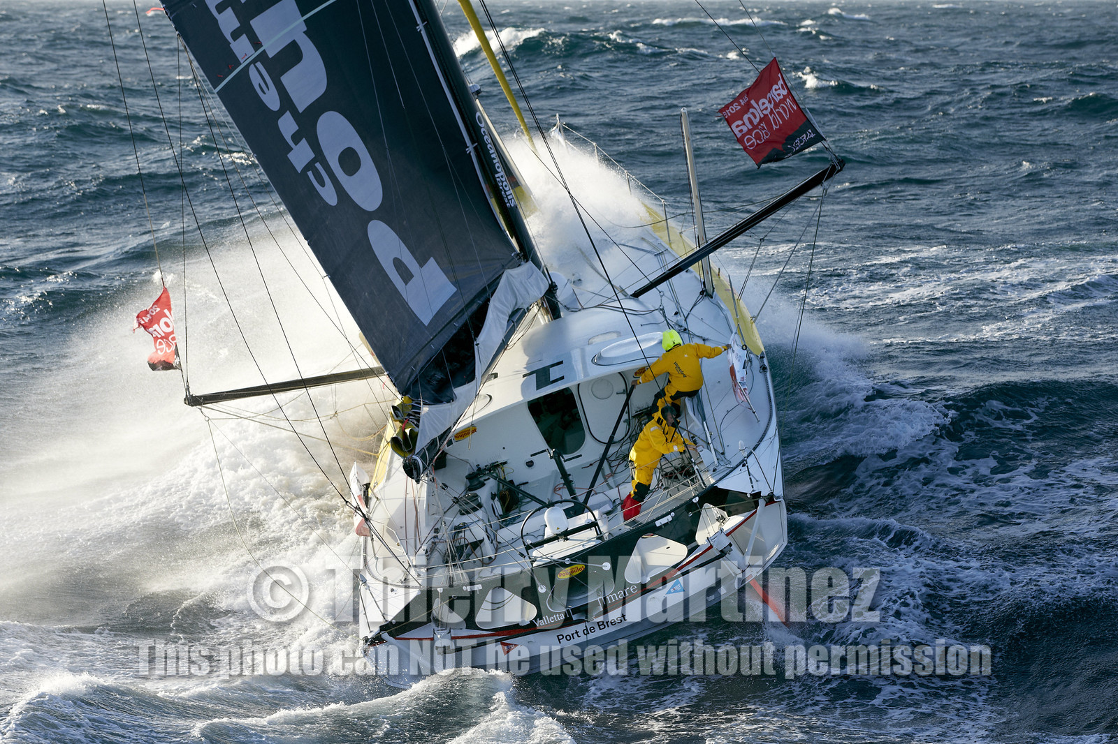 2014 BARCELONA WORLD RACE. Bernard Stamm (SUI) & Jean Le Cam (FRA) on CHEMINEES POUJOULAT