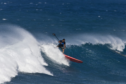 Stand Up Paddle  in waves at Hookip'a Beach - North Shore Maui - Hawaii.