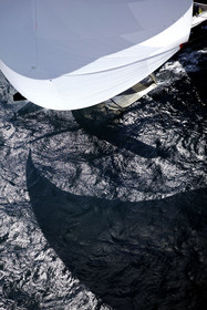 03_0199D ©Th.Martinez - Auckland (NZ) . America's Cup 2003. 18th February 2003. Day 3..Alinghi (SUI 64) vs Team NZ (NZL 82) .NZL 82 in last downwind leg...