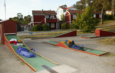 03_3197D © Th.Martinez,STOCKHOLMSWEDEN9 07 03-Archipelago Raid (2003). Sandhamn (SWE) stopover. Few hours to sleep. JOBMAN crew find a nice spot to sleep on the Mini-Golf.