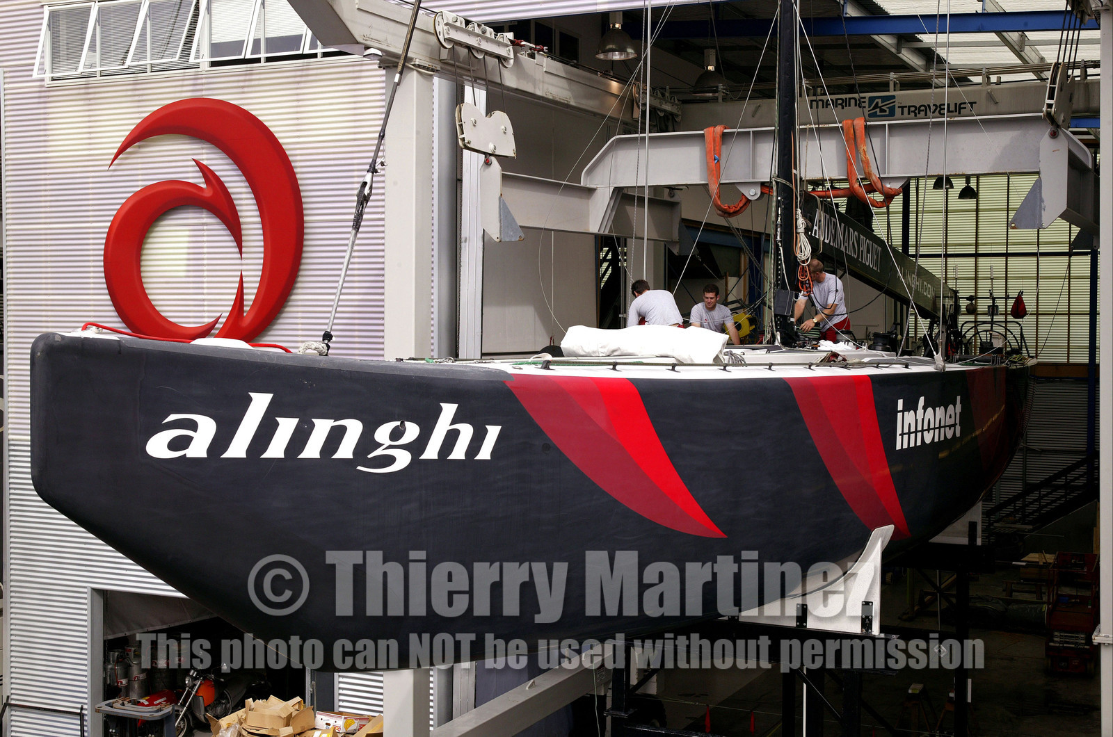 03_1064D © Th.Martinez Auckland   New Zealand. 24th February 2003  America's Cup 2003. Day 4, Race cancelled lack of wind. Alinghi (SUI64) vs Team New Zealand (NZL82)For fourth times in row race day 4 of the America's Cup 2003 have been cancelled . The two race boat have been left in sheds. SUI 64..