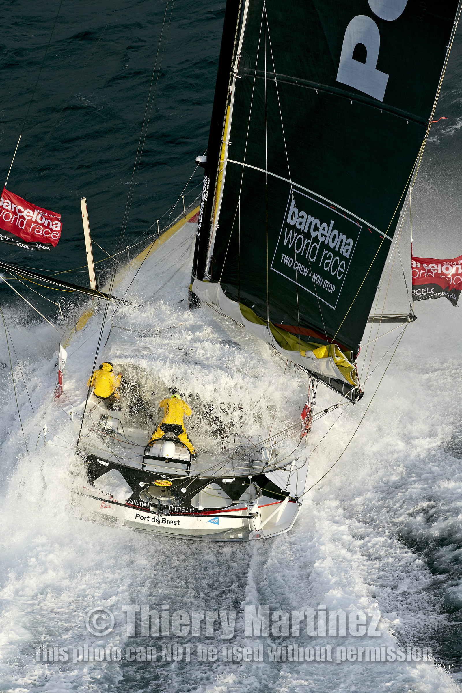 2014 BARCELONA WORLD RACE. Bernard Stamm (SUI) & Jean Le Cam (FRA) on CHEMINEES POUJOULAT