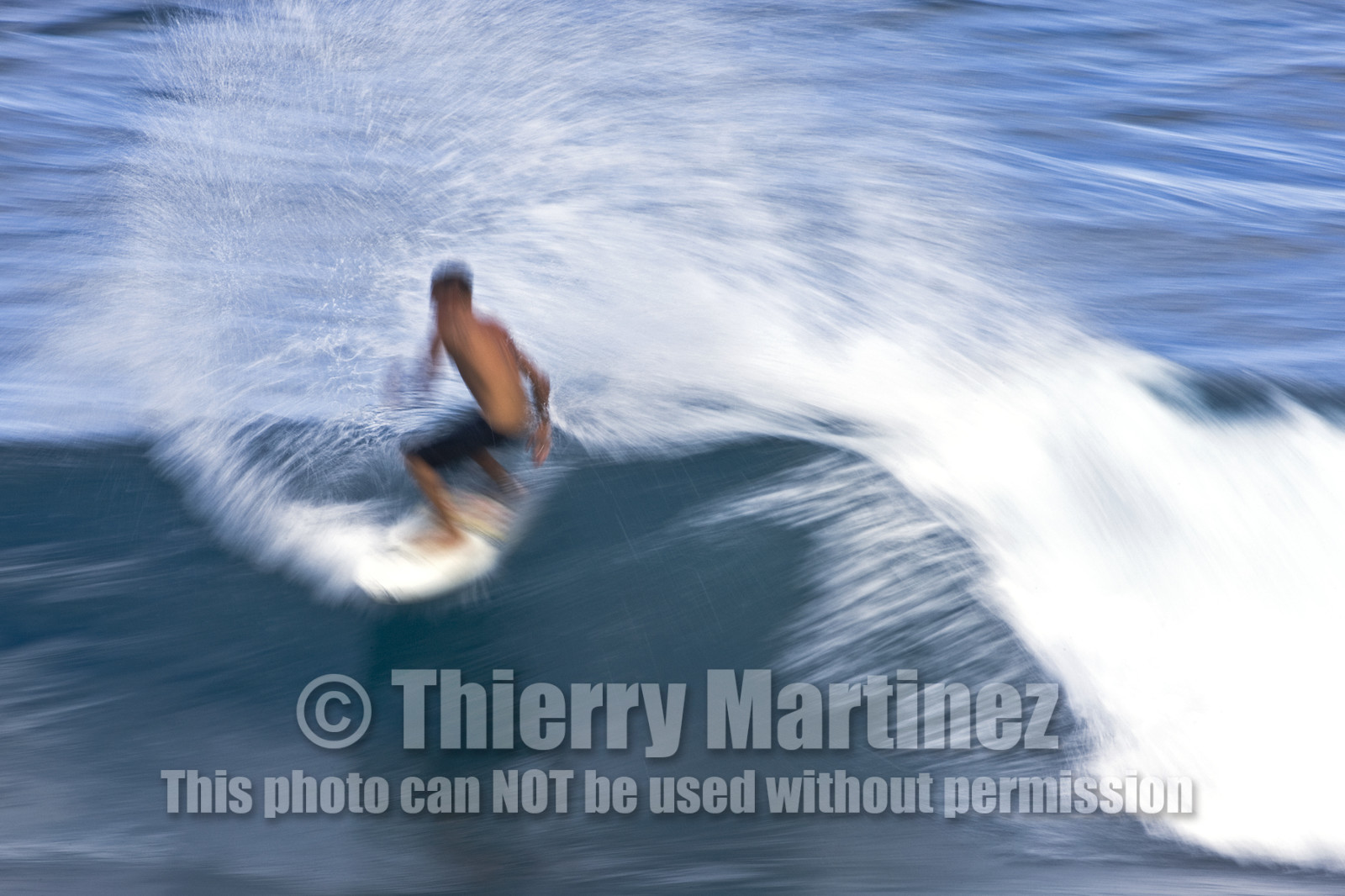 Surf in waves at Hookip'a Beach - North Shore Maui - Hawaii.