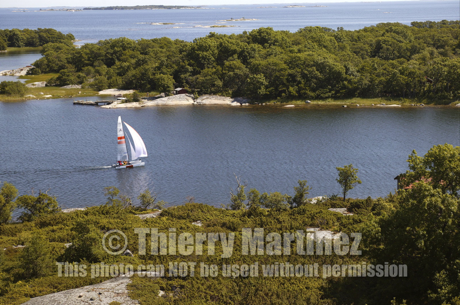 03_3164D  © Th.Martinez,STOCKHOLM ARCHIPELAGO-SWEDEN9 07 03-Archipelago Raid (2003)  Leg 2.JOBMAN arriving at RODLOGA check point.