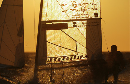 03_3236D 03_3215D  © Th.Martinez,STOCKHOLM - SWEDEN10 07 03-Archipelago Raid (2003). Leg4: Marieham (Finland) TO Fejan (SWE). Team Nokia - Kempff , Magnus Nordstrom and Joakim Kempff at the helm in scandinavian sunset.