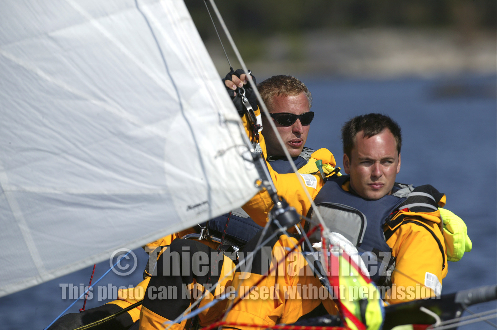 03_3070D   © Th.Martinez,STOCKHOLM ARCHIPELAGO SWEDEN, 8 07 03-Archipelago Raid (2003)  Day 1. Team NOKIA-Adilstam  .Frederik Aldistam (SWe) and Tomas Marimon (SWE) at the helm.