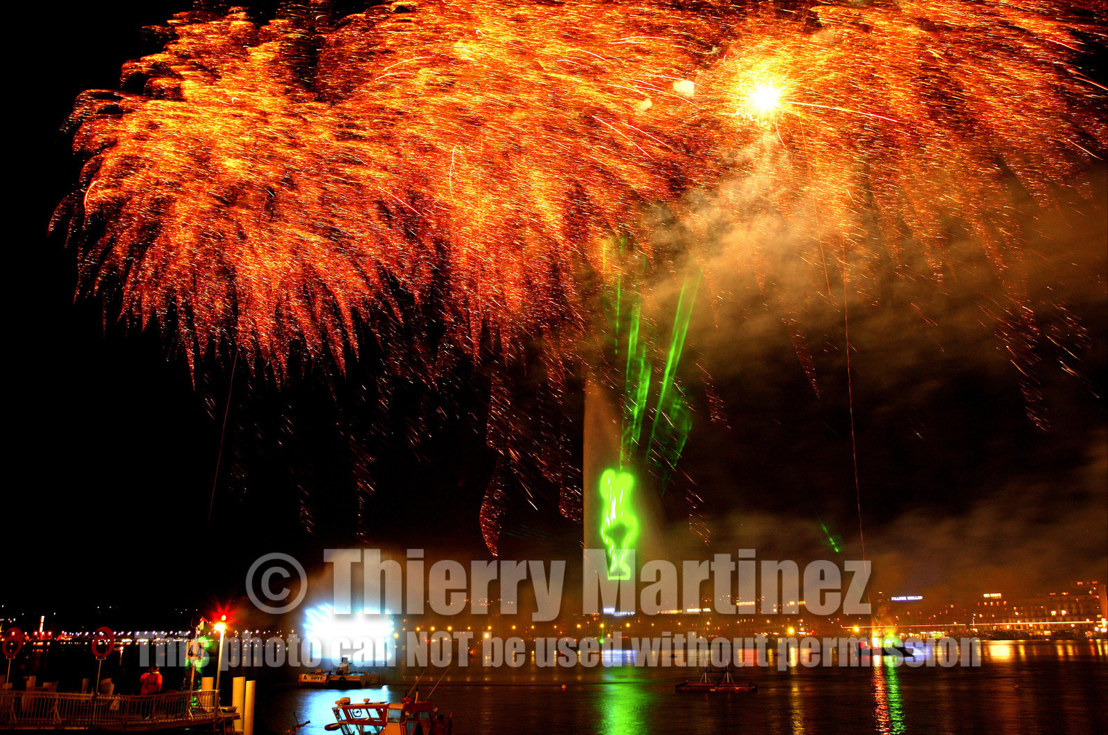 03_2268D ©Th.Martinez .Geneva , Switzerland. America's Cup 2003. 8th March 2003.Alinghi Team winner of America's Cup 2003..Welcome to Alinghi Team in Geneva.Firework and laser show by the lac...